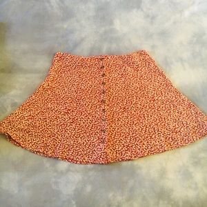 American Eagle red flowery short skirt.